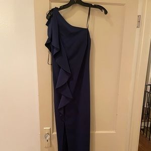 Navy one-shoulder gown woth ruffle down the side
